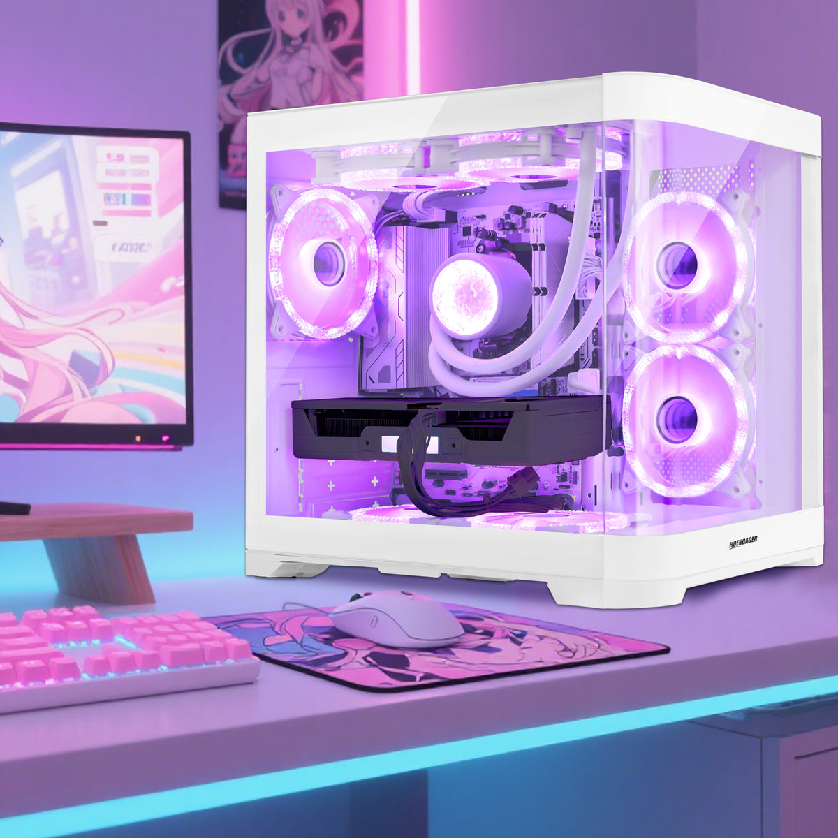 Hoengager Poseidon White gaming desktop set up on a white desk alongside gaming keyboard, mouse, and monitor setup