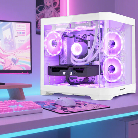 Hoengager Poseidon White gaming desktop set up on a white desk alongside gaming keyboard, mouse, and monitor setup